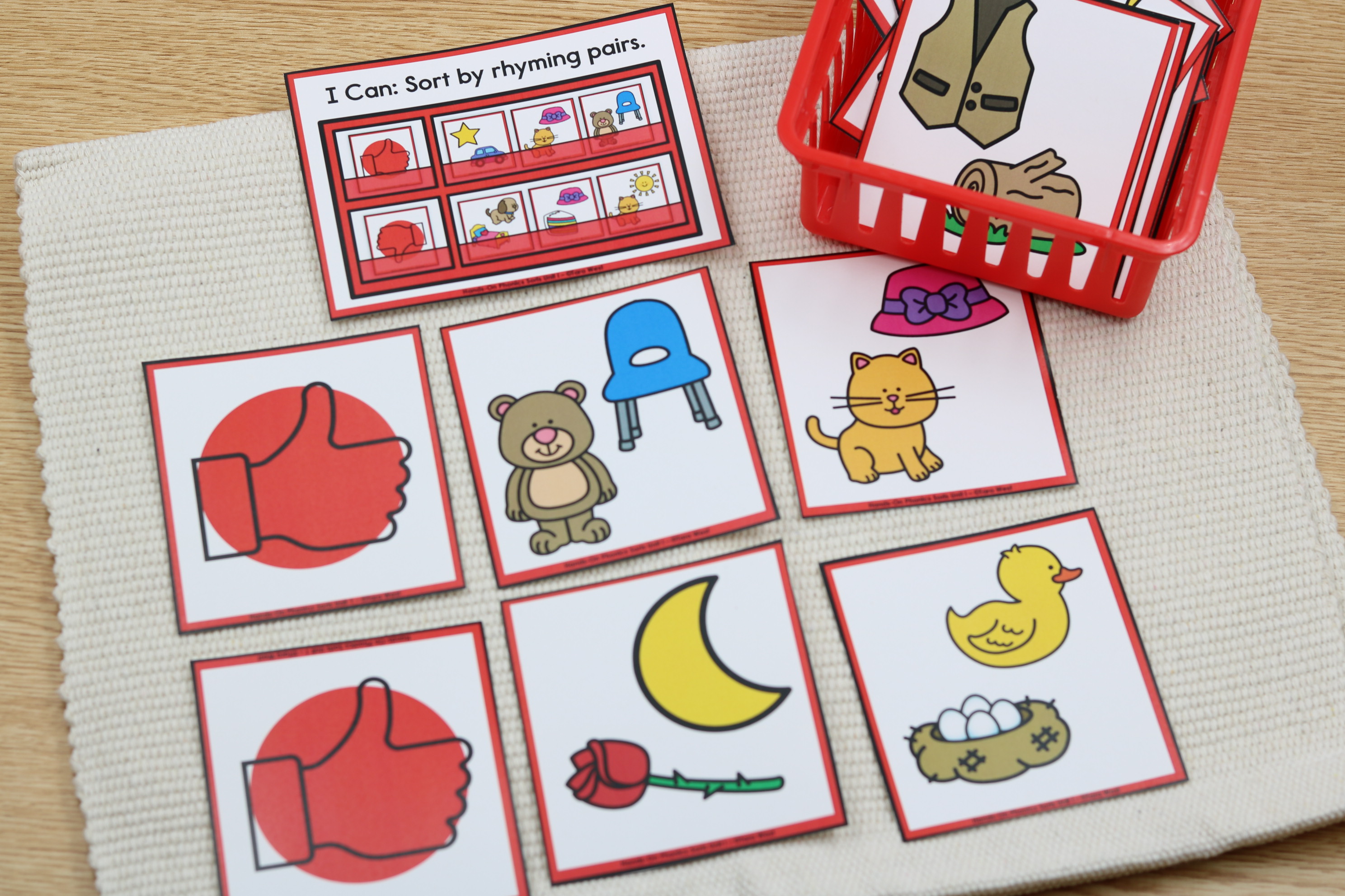 Rhyming sort activity with thumbs up and thumbs down cards