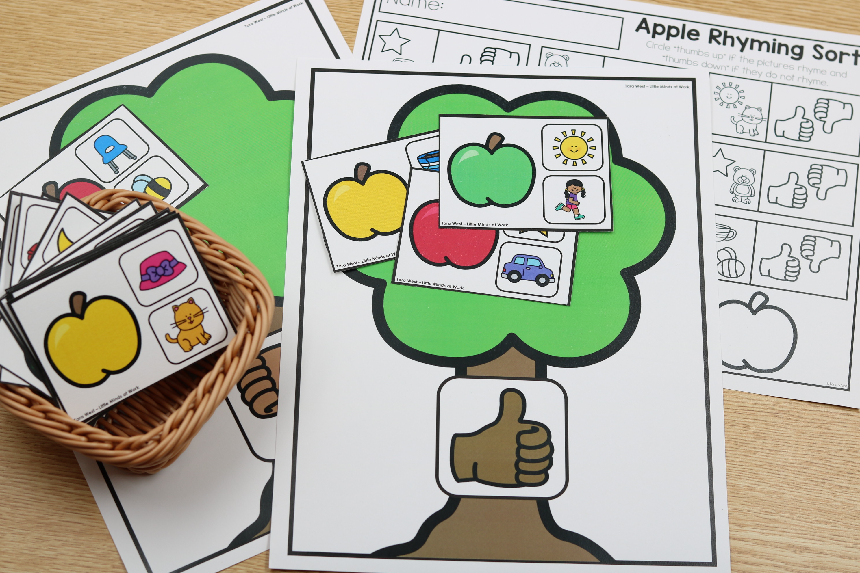 Rhyming sort cards laid out with sorting mats and response sheet