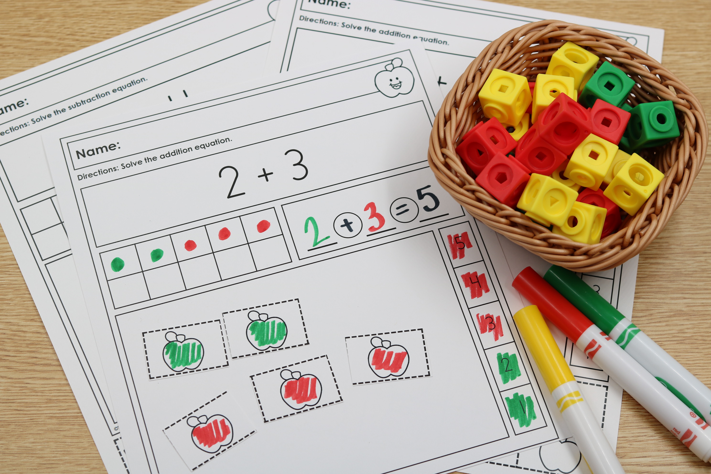 Apple center activity for solving math equations to 10