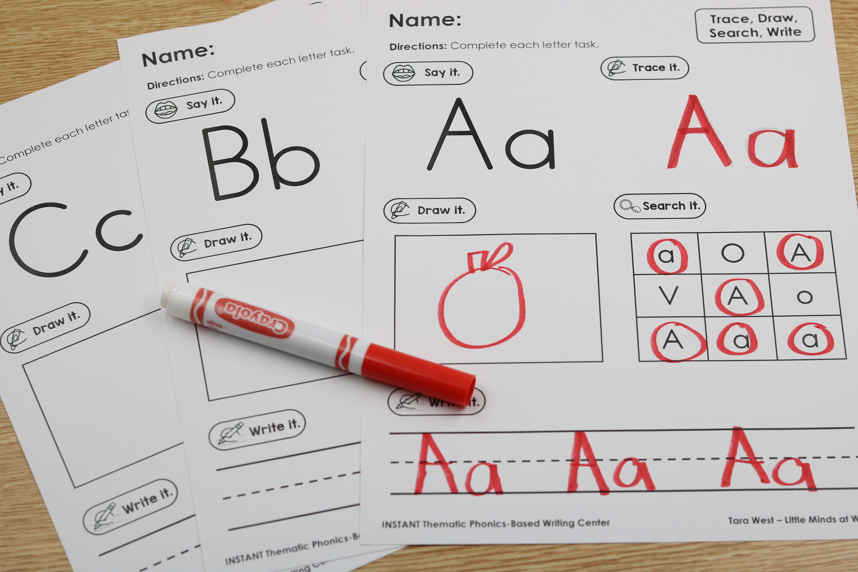 Alphabet practice worksheet with sections to say, trace, draw, search, and write the letter.