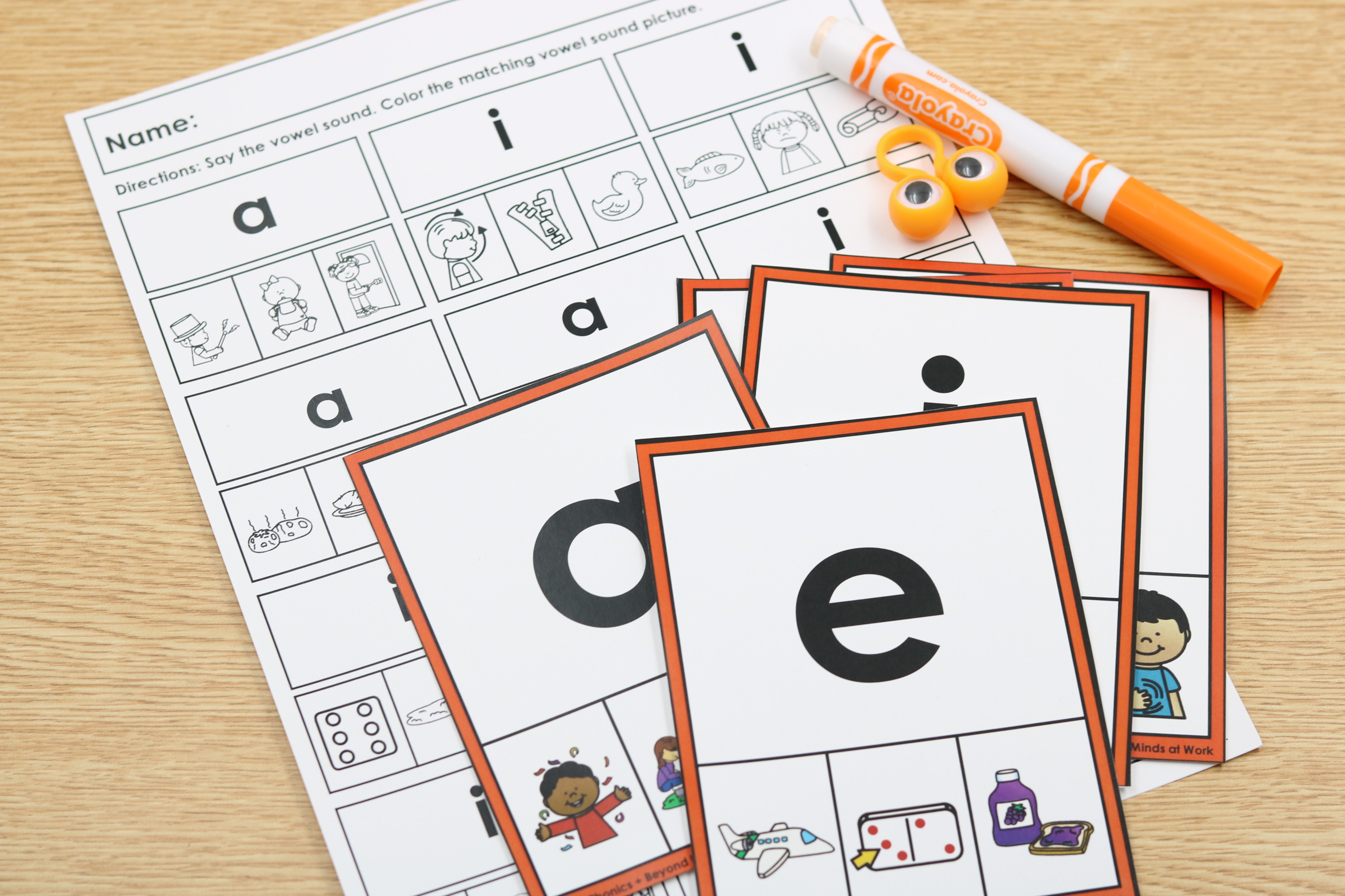 CVC vowel clip cards for phonics practice with matching pictures