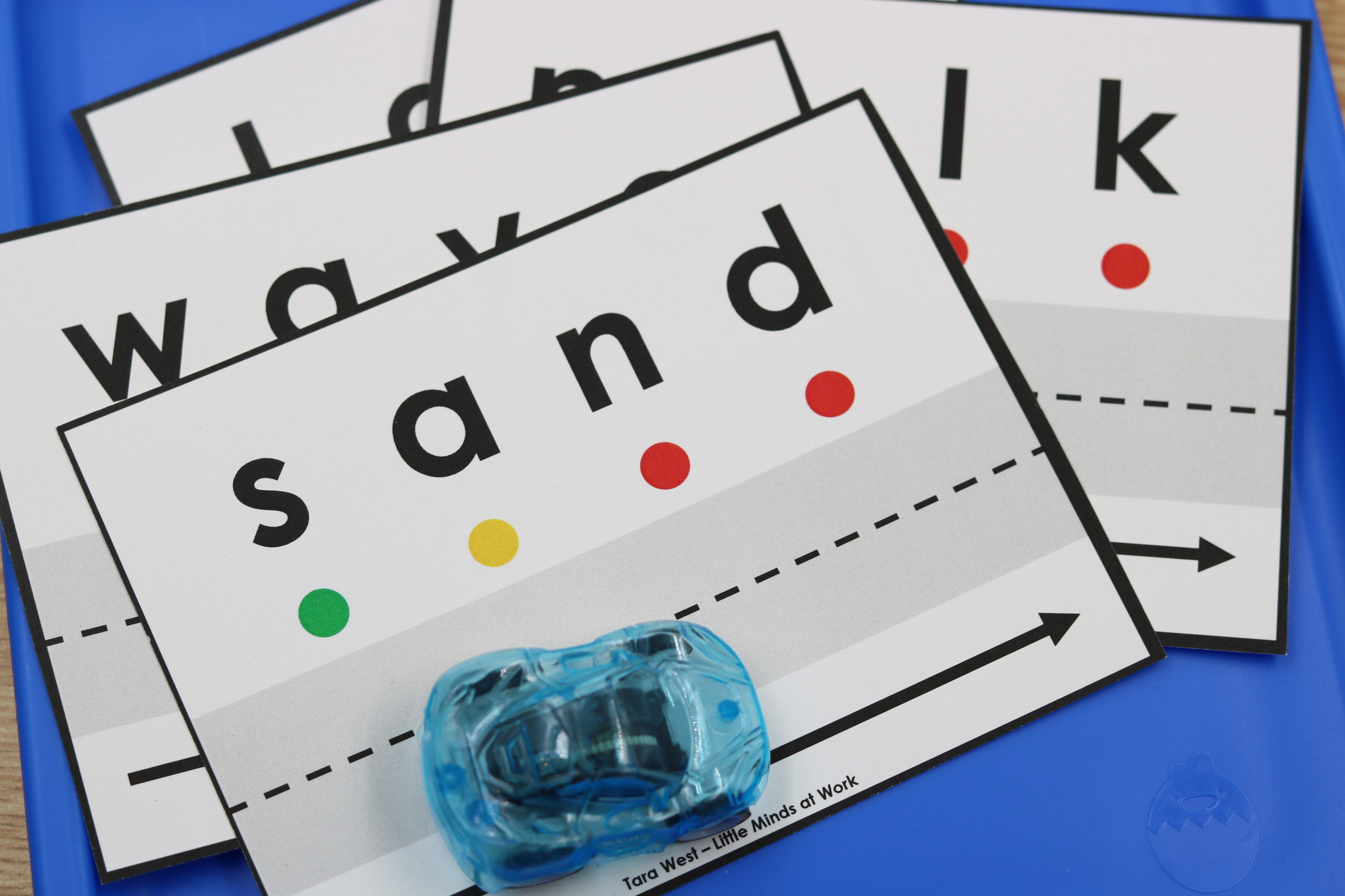 Up close picture of CVCC words drive that sound science of reading free center.