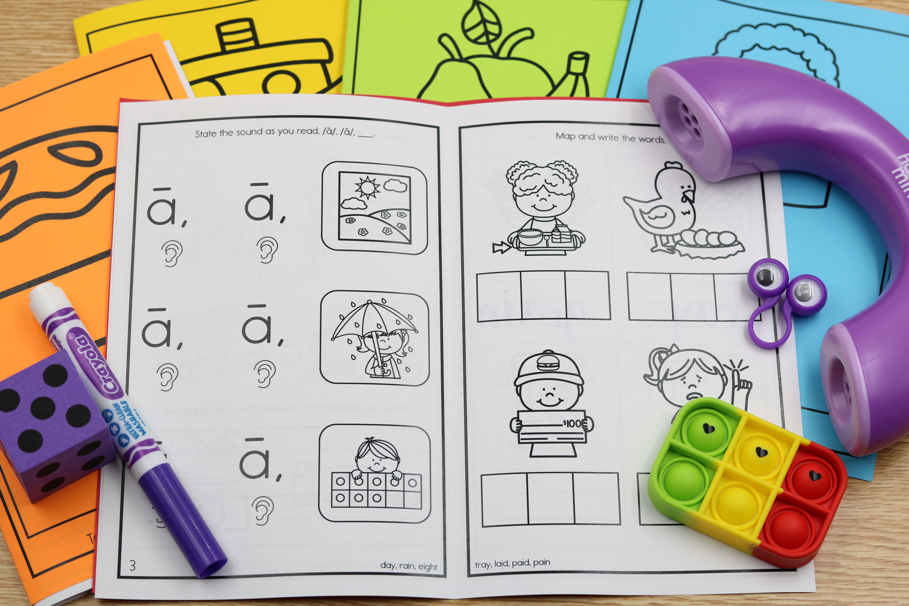 Vowel variant phonics booklets for decoding and mapping words